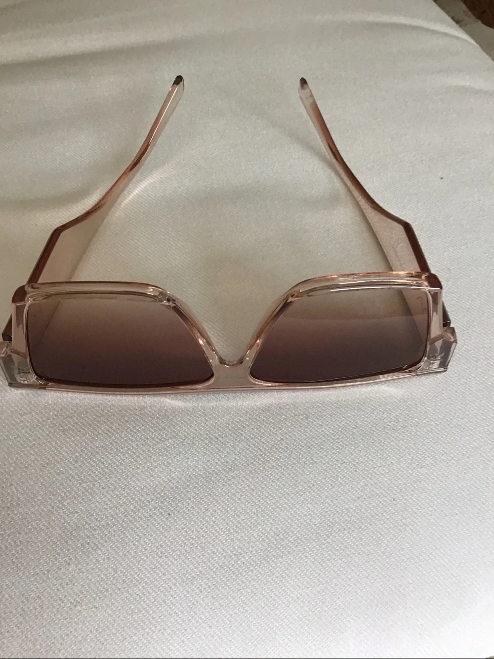 Sunglasses, peaches color.